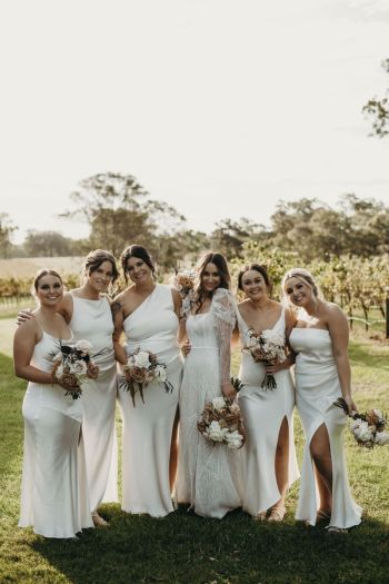 Bride and her bridesmaids in all white dresses at Enzo Weddings Hunter Valley6
