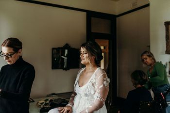 Bride sitting in the makeup chair at Hunter Valley wedding venue Wallalong House