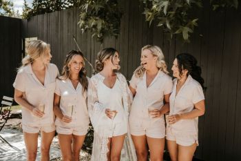 Bride and her bridesmaids in their pjs at Hunter Valley wedding venue The Woodhouse Wollombi