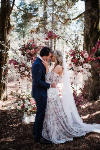 Bride and Groom in front of beautiful ceremony backdrop at Allview Escape Blue Mountains