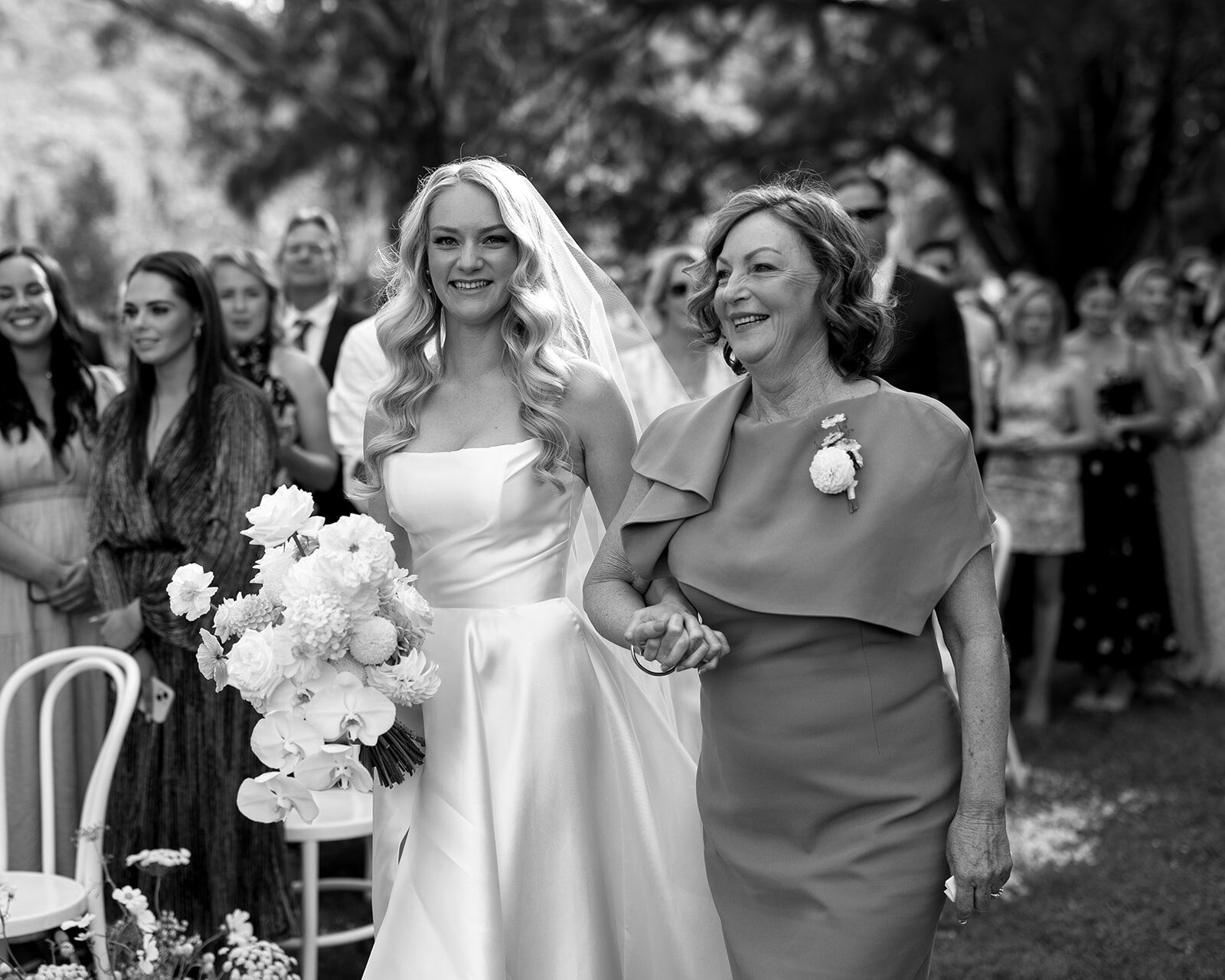Mother of the bride walking her daughter down the isle at The Woodhouse Wollombi Hunter Valley